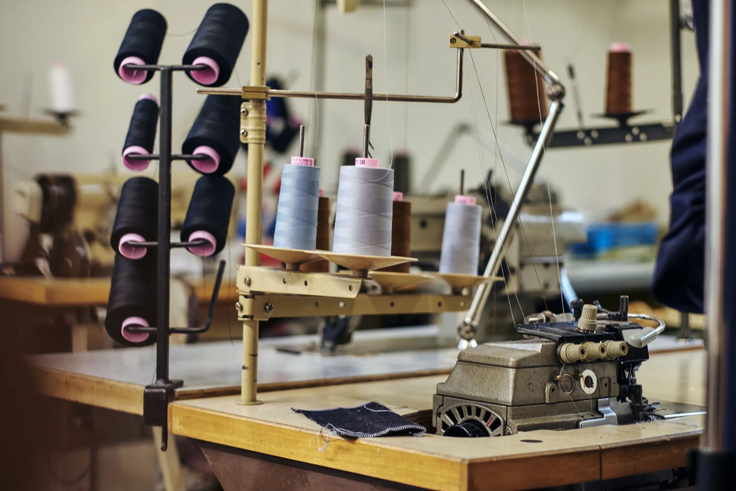 close up image lot coils with threads sewing workshop