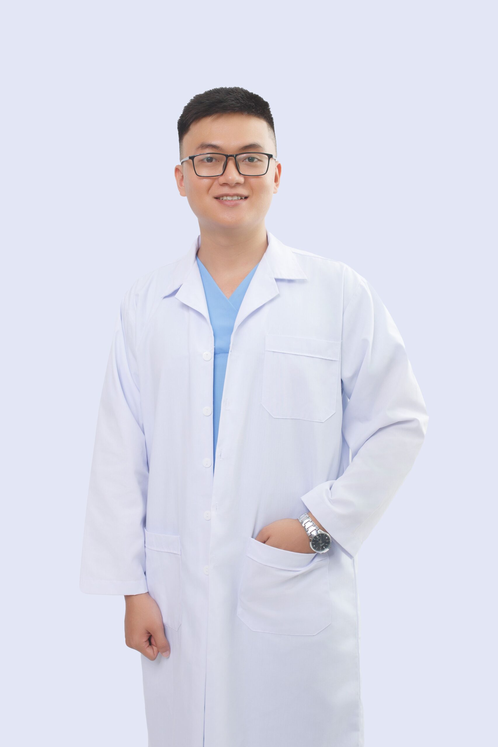 Asian male medical professional in lab coat smiling confidently.