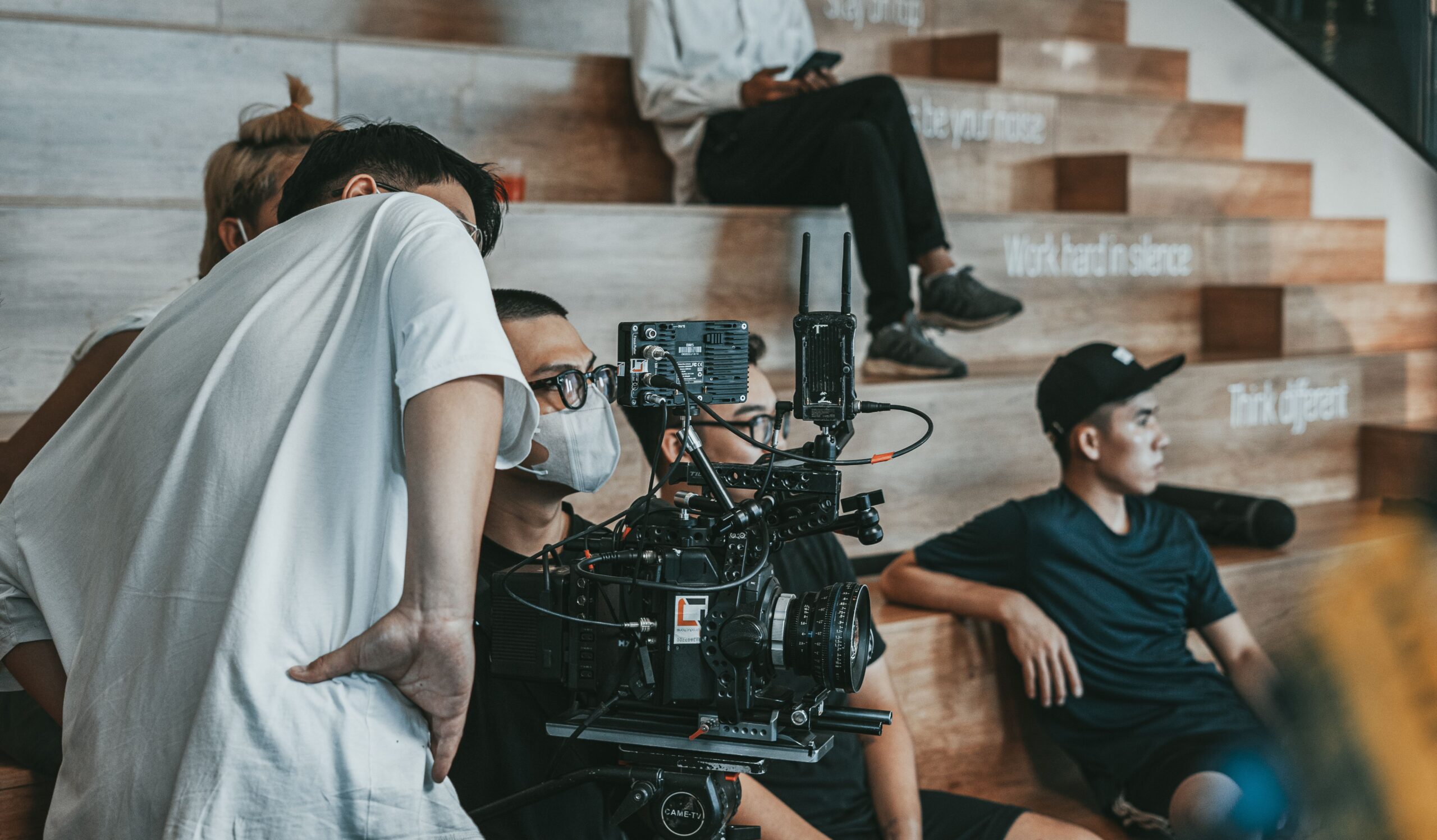 Crew members working together in a creative movie production environment.